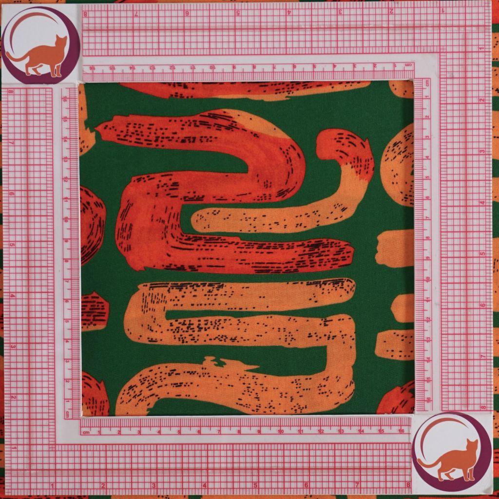 Preview: Viskose Druck grafisches Muster apricot rot grün